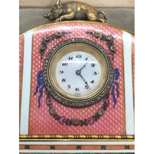 1115 - A stunning Russian silver and enamel diamond clock 

Weight 233.3 grams 
Height to hog top 9cm
Lengt... 