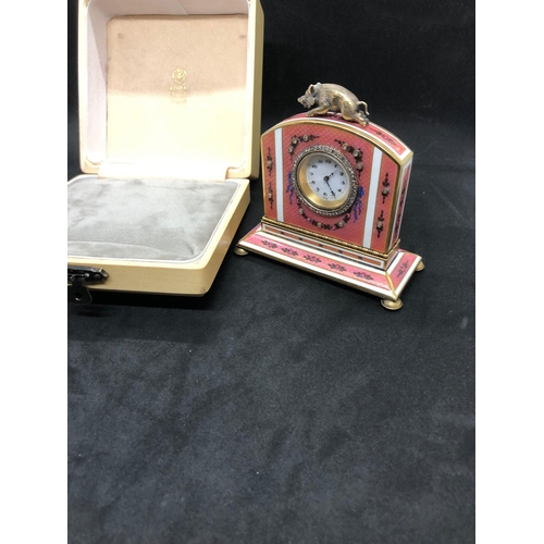 1115 - A stunning Russian silver and enamel diamond clock 

Weight 233.3 grams 
Height to hog top 9cm
Lengt... 