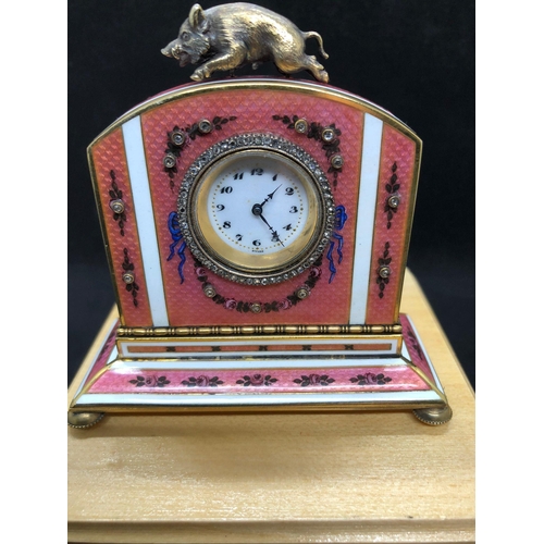 1115 - A stunning Russian silver and enamel diamond clock 

Weight 233.3 grams 
Height to hog top 9cm
Lengt... 