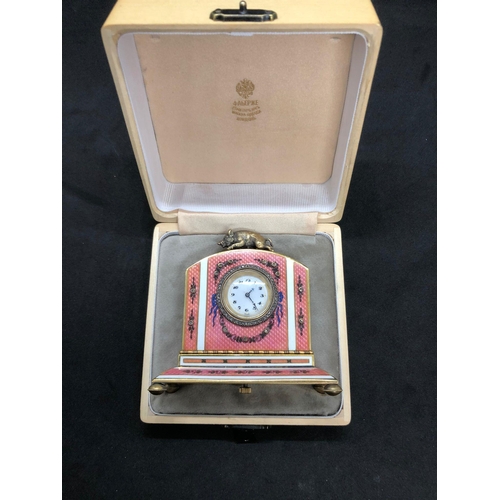 1115 - A stunning Russian silver and enamel diamond clock 

Weight 233.3 grams 
Height to hog top 9cm
Lengt... 