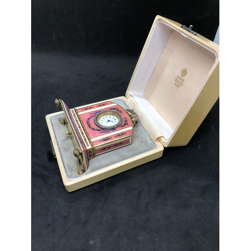 1115 - A stunning Russian silver and enamel diamond clock 

Weight 233.3 grams 
Height to hog top 9cm
Lengt... 