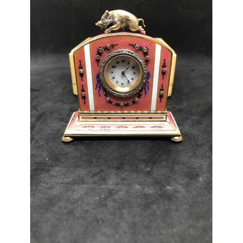 1115 - A stunning Russian silver and enamel diamond clock 

Weight 233.3 grams 
Height to hog top 9cm
Lengt... 