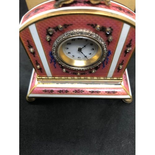 1115 - A stunning Russian silver and enamel diamond clock 

Weight 233.3 grams 
Height to hog top 9cm
Lengt... 