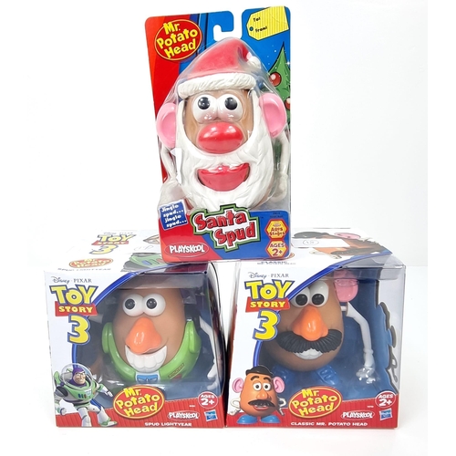 1025 - Three Very Collectable Mr Potato Head Toys. To include: Santa Spud, Toy Story 3 Classic and Spud Lig... 