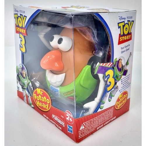 1025 - Three Very Collectable Mr Potato Head Toys. To include: Santa Spud, Toy Story 3 Classic and Spud Lig... 