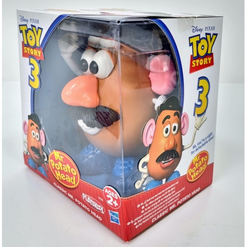 1025 - Three Very Collectable Mr Potato Head Toys. To include: Santa Spud, Toy Story 3 Classic and Spud Lig... 