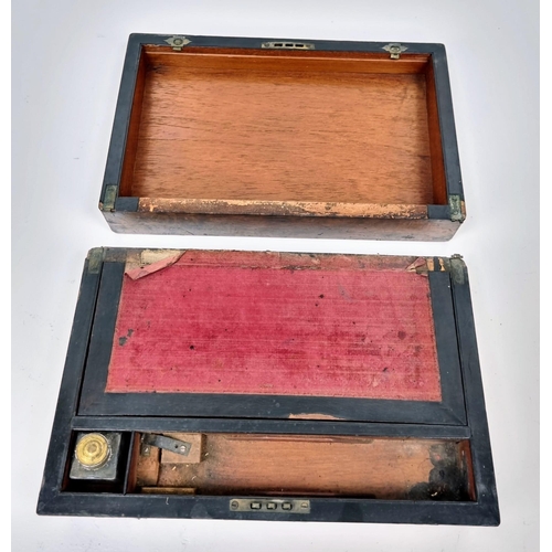 1303 - An Antique Victorian Writing Box/slope. Ink well and pen compartments. Pull up storage compartment w... 