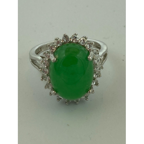 308 - SILVER RING having large GREEN CHALCEDONY CABOCHON with WHITE TOPAZ surround, mounted and set to top... 