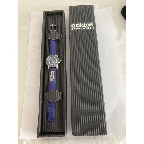 322 - Ladies Quartz  ADIDAS Sports Watch having Navy blue face with contrasting red second hand. Matching ... 