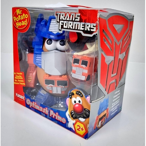 505 - Three Very Collectable Mr Potato Head Toys. To include: Elvis Live, Spider Spud and Transformers. As... 