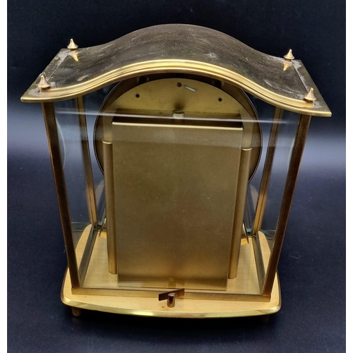 720 - A Vintage German Junghans Brass ATO Mantel Clock. Electronic movement in working order. 17 x 20cm.