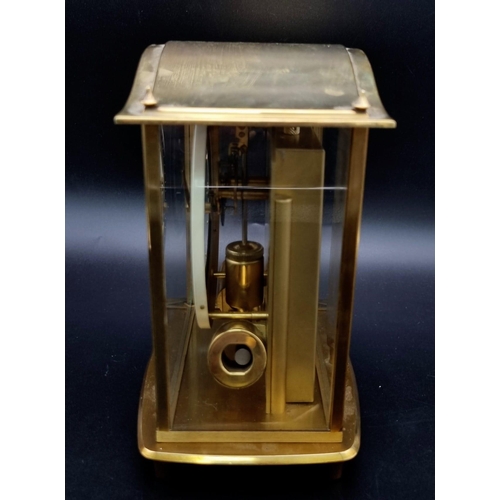 720 - A Vintage German Junghans Brass ATO Mantel Clock. Electronic movement in working order. 17 x 20cm.