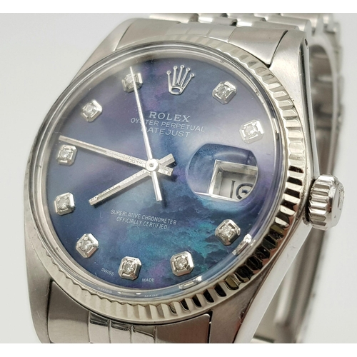 30 - A Rolex Oyster Perpetual Datejust Gents Watch. Stainless steel strap and case - 36mm. Metallic blue ... 