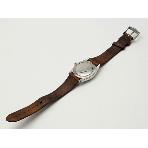 347 - A Rolex Oysterdate Precision Gents Watch. Brown leather strap. Stainless steel case - 36mm. White di... 