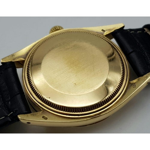 368 - A Rolex Oyster Perpetual Datejust Tiffany and Co 18K Gold Watch. Black leather strap. 18k gold case ... 