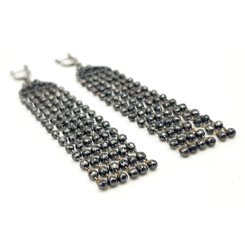 493 - An Extravagant Art Deco Style Pair Of Black Diamond Drop Earrings set In 18K Gold. 15.94g total weig... 