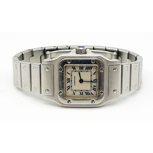 66 - A Cartier Quartz Ladies Watch. Stainless steel strap and case - 25mm. Lug to lug - 40mm. White dial ... 