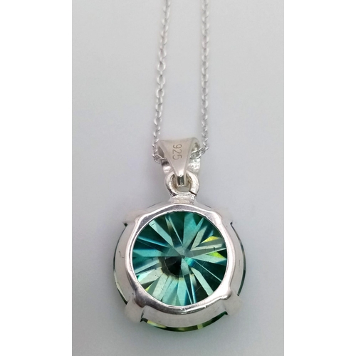 1283 - A 15ct Blue Moissanite pendant set in 925 silver with a disappearing silver necklace. 15mm and 42cm.... 