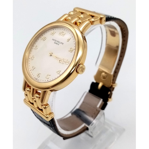 156 - A Patek Phillipe 18K Gold Calatrava Gents Watch. Leather strap with 18k gold buckle and extender. 18... 