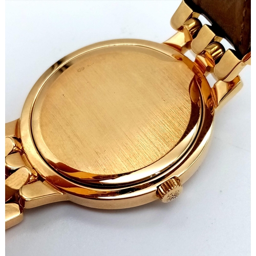 156 - A Patek Phillipe 18K Gold Calatrava Gents Watch. Leather strap with 18k gold buckle and extender. 18... 