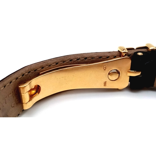 156 - A Patek Phillipe 18K Gold Calatrava Gents Watch. Leather strap with 18k gold buckle and extender. 18... 