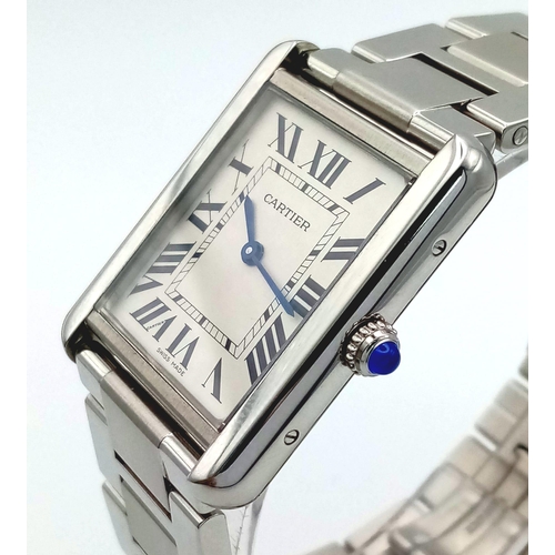 375 - A Cartier Stainless Steel Gents Tank Watch. Case - 27 x 35mm. White dial with roman numerals. Quartz... 