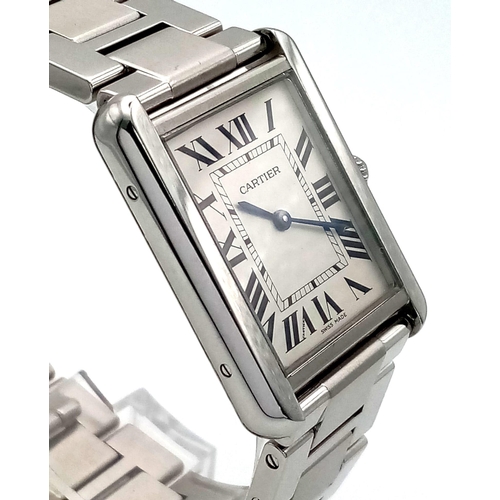 375 - A Cartier Stainless Steel Gents Tank Watch. Case - 27 x 35mm. White dial with roman numerals. Quartz... 