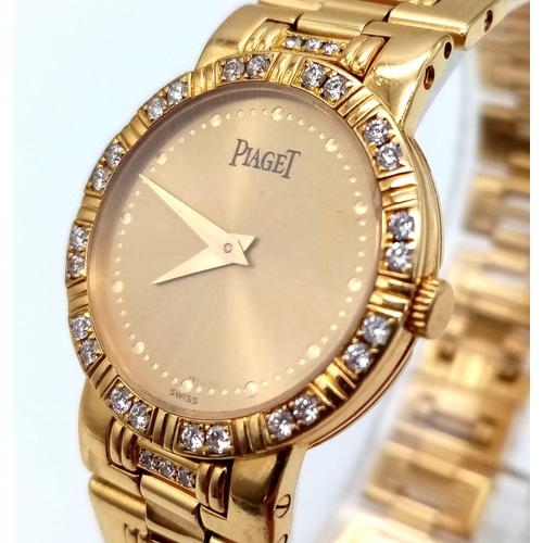 521 - A Piaget 18K Gold and Diamond Ladies Watch. 18K gold with diamonds strap and case - 22mm. Quartz mov... 