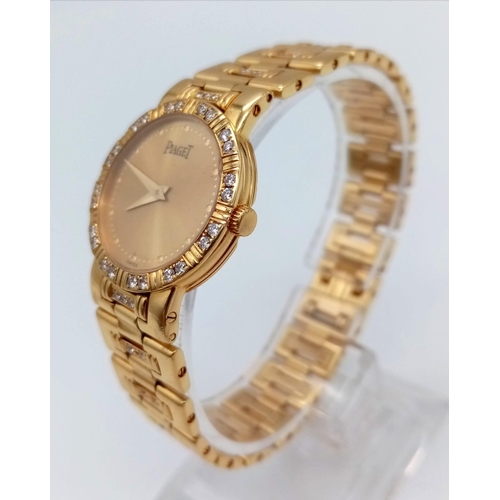 521 - A Piaget 18K Gold and Diamond Ladies Watch. 18K gold with diamonds strap and case - 22mm. Quartz mov... 