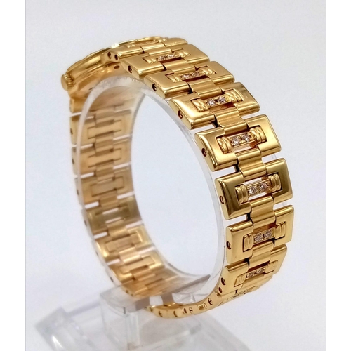 521 - A Piaget 18K Gold and Diamond Ladies Watch. 18K gold with diamonds strap and case - 22mm. Quartz mov... 