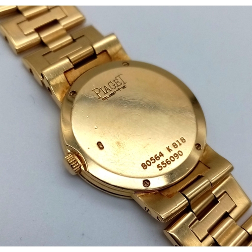 521 - A Piaget 18K Gold and Diamond Ladies Watch. 18K gold with diamonds strap and case - 22mm. Quartz mov... 