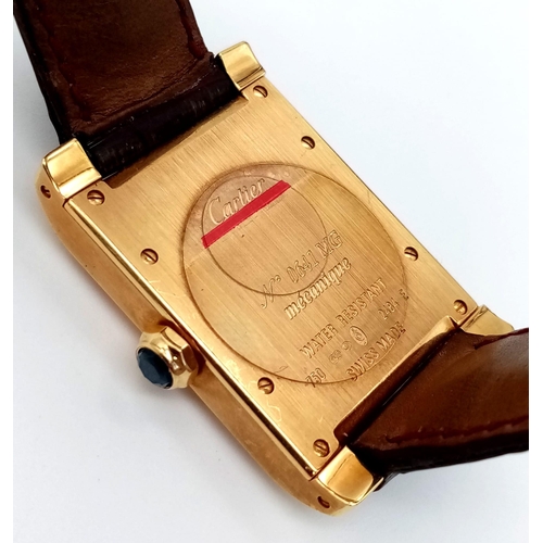 528 - A Cartier 18K Gold Ladies Tank Watch. Original strap with 18K gold extended clasp. 18K gold case - 2... 