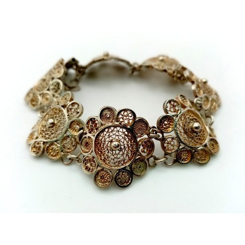 1193 - A Vintage or Antique Silver Filigree Bracelet 17cm length approximately.