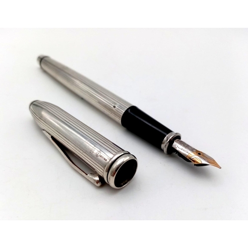 1059 - A Silver Cross Fountain Pen with an 18K Two Tone Nib. 15cm