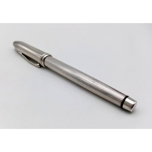 1059 - A Silver Cross Fountain Pen with an 18K Two Tone Nib. 15cm