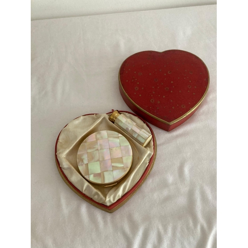 427 - Vintage 1960s Mother of pearl COMPACT  and matching LIPSTICK HOLDER presented in a satin lined heart... 