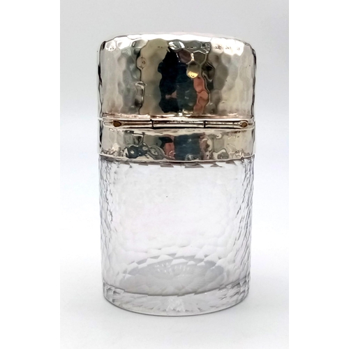 689 - A Sterling Silver Collar and Topped Glass Condiment Bottle. 9cm tall. 356g total weight.