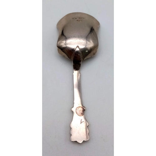 708 - A Sterling Silver George Unite Caddy Spoon. Hallmarks for Birmingham 1848. 9cm. 7.47g.