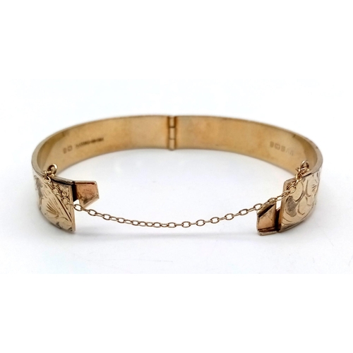 730 - A Lovely Vintage Silver Gilt Bracelet. Open clasp and safety chain. 6cm inner diameter. 36.21g.