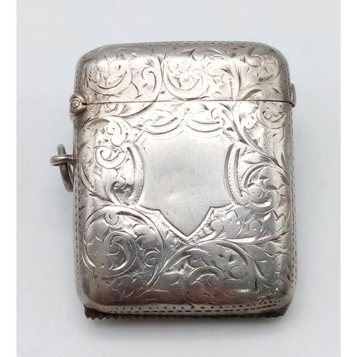 855 - A Sterling Silver Antique Vesta Case. Makers mark of William Neal. Sheffield hallmark. 39g. 4.5 x 5c... 