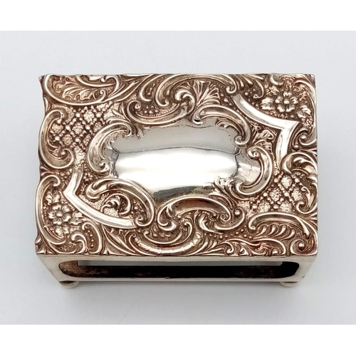 880 - An Antique Sterling Silver Repousse Matchbox Holder. Hallmarks for Birmingham 1901. 7.5 x 5cm. 34g