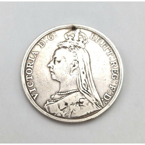 904 - An 1892 Queen Victoria Silver Crown Coin. 27.94g. Please see photos for conditions.