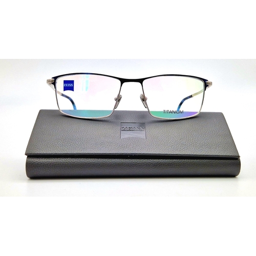 1051 - A Pair of As new, Boxed, Zeiss Titanium Spectacle Frames.