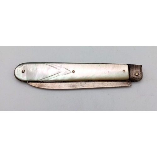 1093 - An Antique Sterling Silver and Mother of Pearl Fruit Knife. 14cm extended. Hallmarks for Sheffield 1... 