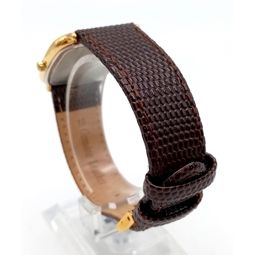 417 - A Vintage Longine Quartz Gents Watch. 7556238. Cal L.238.2. Brown leather strap. Rectangular gilded ... 