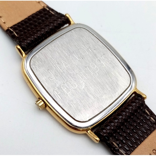 417 - A Vintage Longine Quartz Gents Watch. 7556238. Cal L.238.2. Brown leather strap. Rectangular gilded ... 