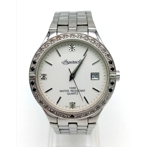 1195 - An Ingersoll Gem Encrusted Quartz Gents Watch. Stainless steel strap and case - 40mm. White dial wit... 