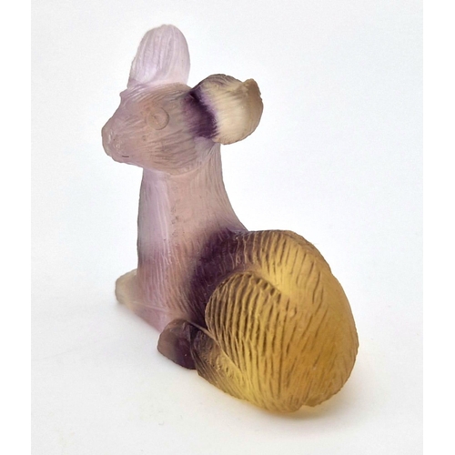 426 - A Hand-Carved Rainbow Flourite Crystal Deer Figure. 5 x 5cm.