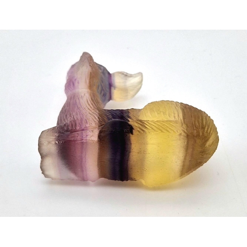 426 - A Hand-Carved Rainbow Flourite Crystal Deer Figure. 5 x 5cm.