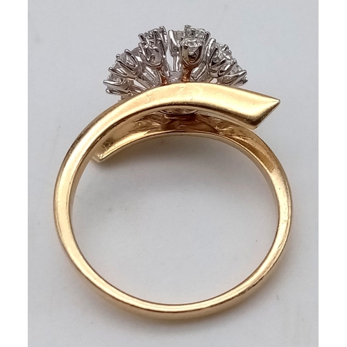 926 - An unusual design of a 14 K yellow gold ring with a cluster of diamonds (one missing), size: M, weig... 